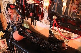 Austin Dominatrix Mistress Scarlet Vexus wearing custom hat