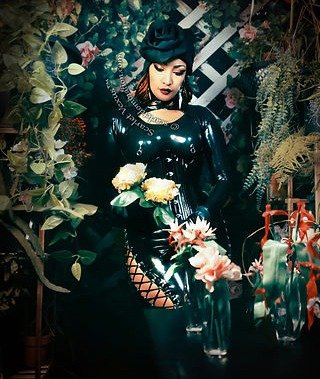 Austin Dominatrix Scarlet Vexus in custom catsuit